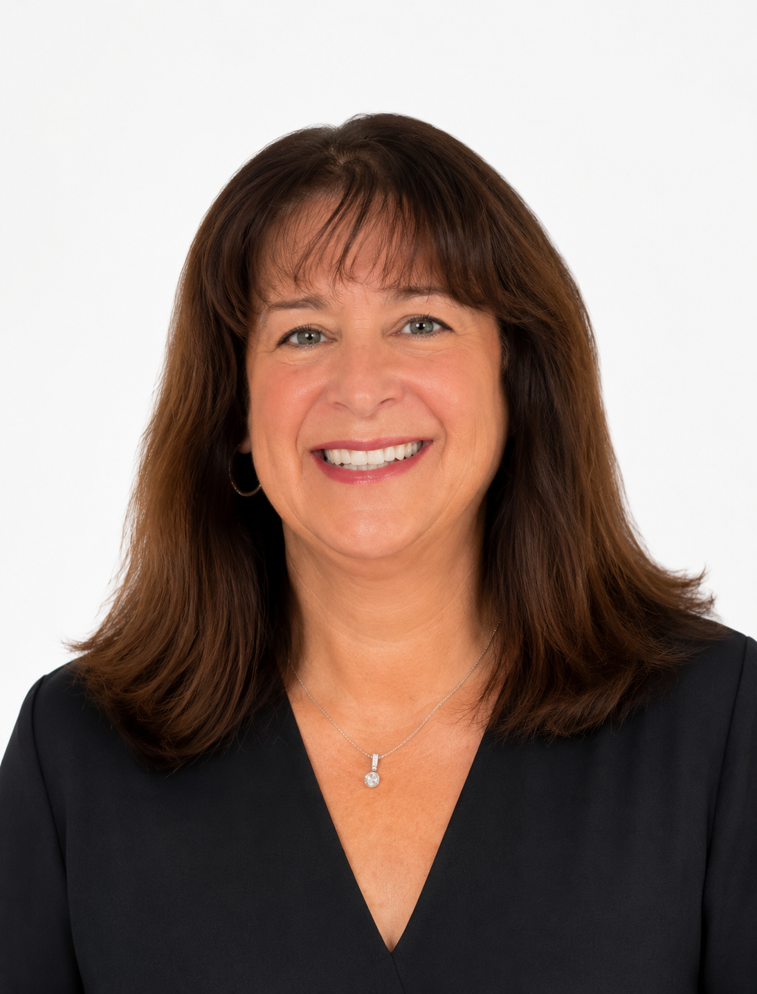 A woman with long hair and wearing a black shirt.